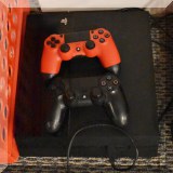 E10. PS4 system and games. 